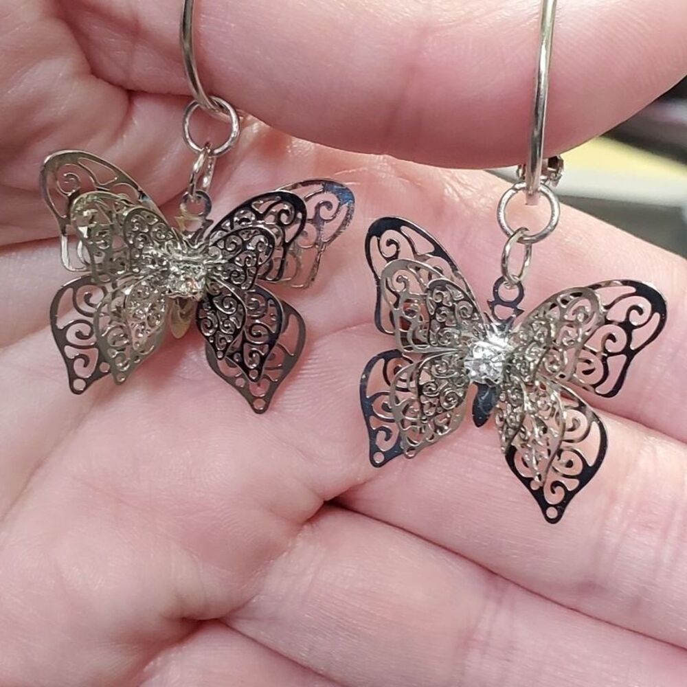 Silver tone butterfly on hoops earrings